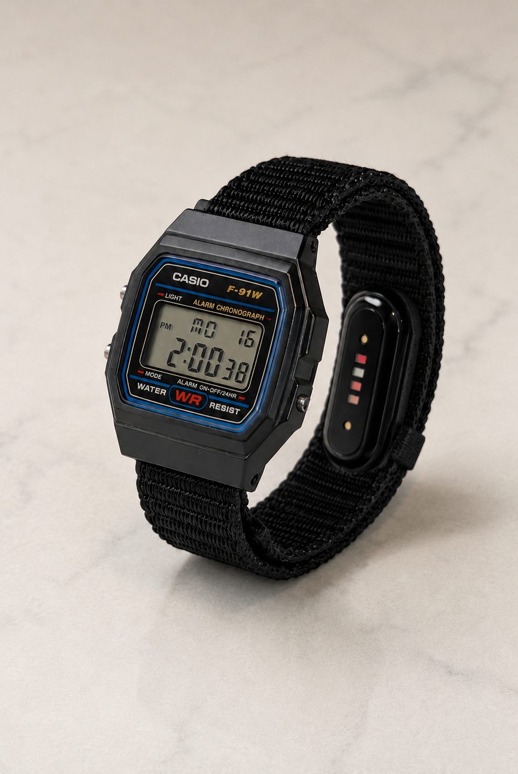 PIV F-91 — Casio F-91W with Fitbit Air pebble holder